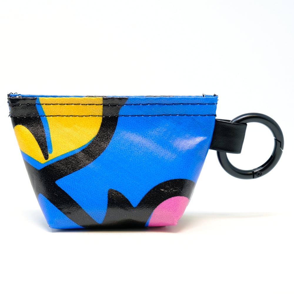 Rear view of a GreenLine Banner Bag, which is a poop bag pouch made of upcycled festival banners.
