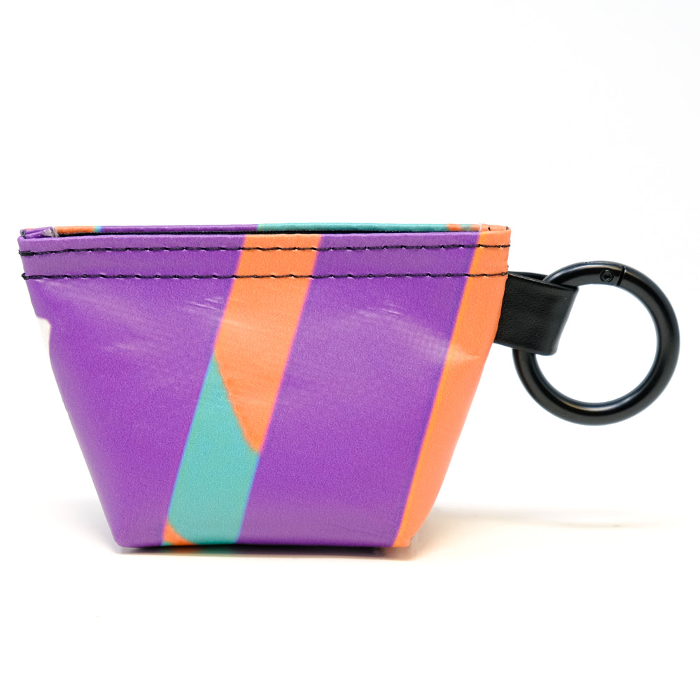 Rear view of a GreenLine Banner Bag, which is a poop bag pouch made of upcycled festival banners.