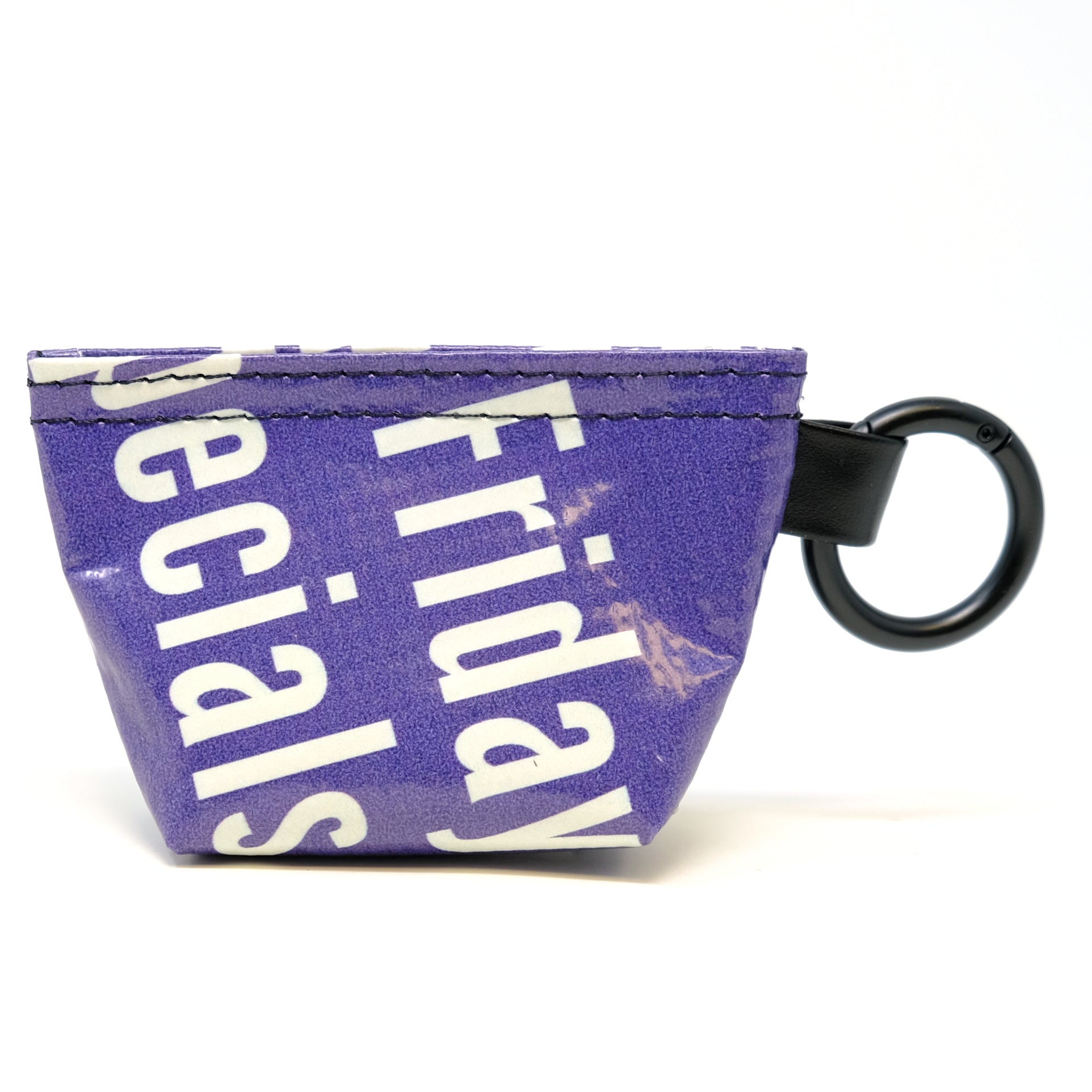 Rear view of a GreenLine Banner Bag, which is a poop bag pouch made of upcycled festival banners. 
