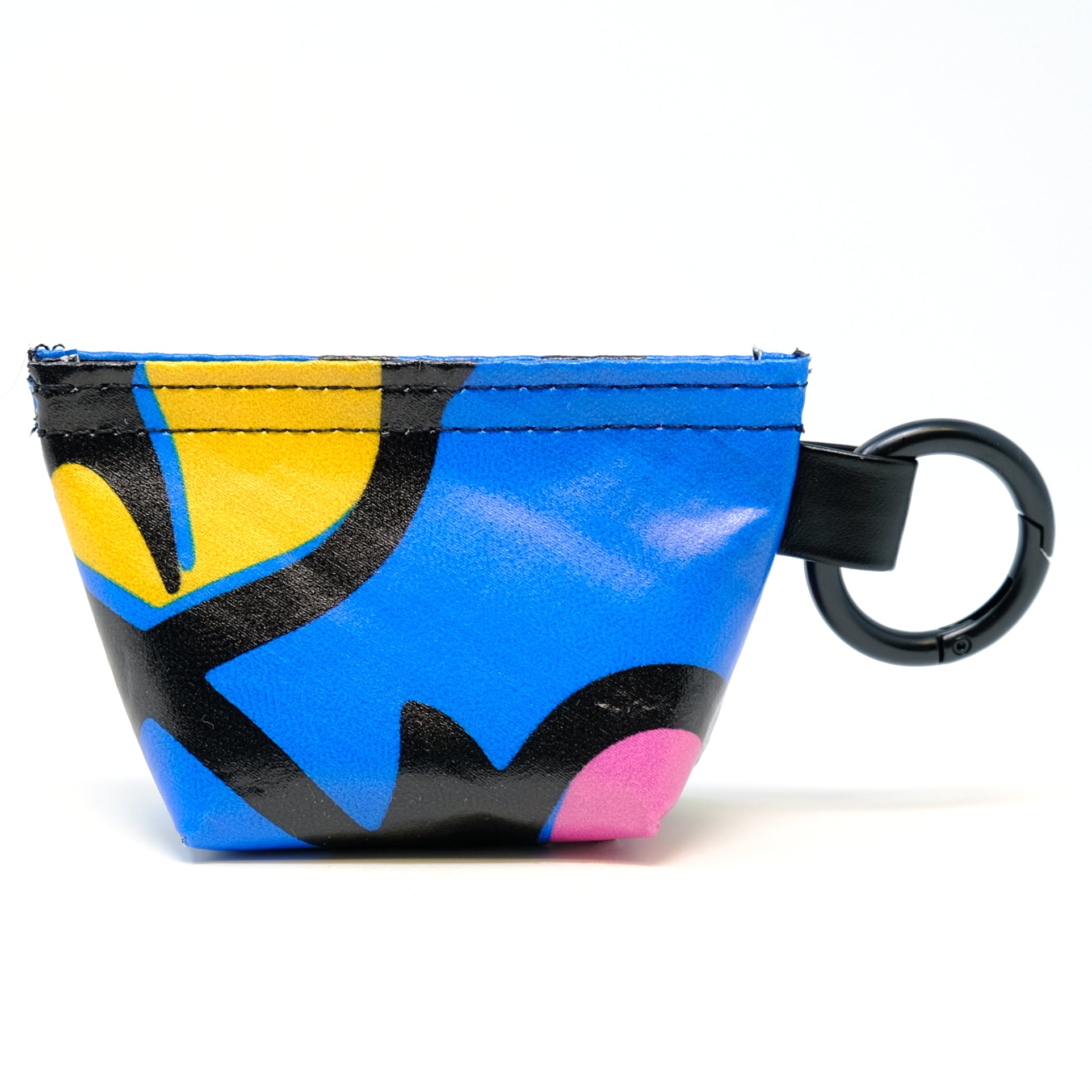 Rear view of a GreenLine Banner Bag, which is a poop bag pouch made of upcycled festival banners. 
