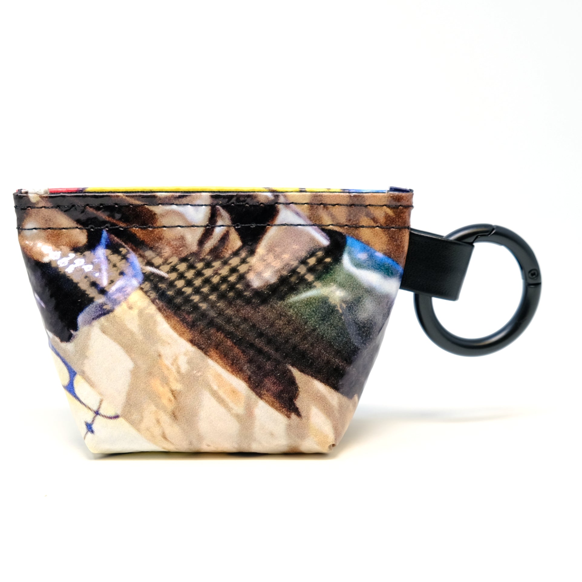 Rear view of a GreenLine Banner Bag, which is a poop bag pouch made of upcycled festival banners. 