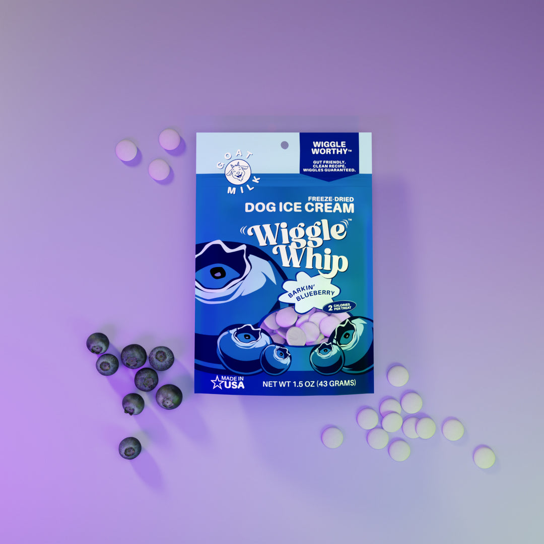 Barkin' Blueberry Wiggle Whip freeze-dried dog ice cream package with blueberries on a purple background